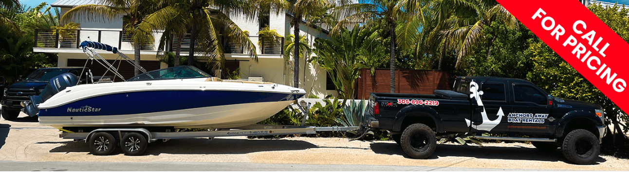 Anchors Away Boat Rentals - Image of our truck delivering a boat as a service we offer